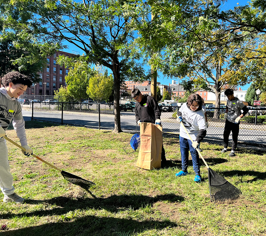 spicket river cleanup volunteers raking